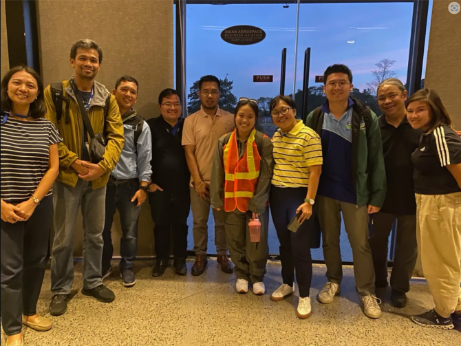 Langley’s Angelique Demetillo, center, in her flight suit after a flight in the Philippines for the ASIA-AQ mission along with mission partners from the Philippine Department of Environment and Natural Resources (DENR) and Manila Observatory. NASA/Kevin Rohrer