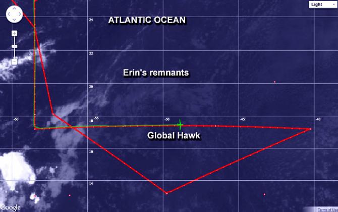 This infrared image from NOAA's GOES-East satellite on Aug. 20 shows the Global Hawk crossing the low-level remnants of Erin. Erin's low-level clouds appear as a faint circulation. The green path is the direction the Global Hawk came from. The red line represents the path the aircraft would follow.