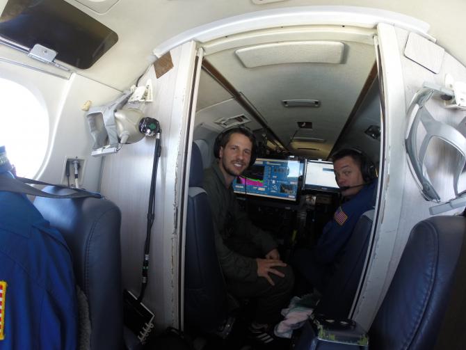 NASA Langley team members Richard Hare, left, and David Harper aboard Langley's UC-12. The team used an instrument called High Spectral Resolution Lidar, or HSRL-1, to collect data on the vertical distribution of phytoplankton in the Atlantic Ocean.