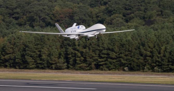 NASA's Global Hawk 871 lifts off from NASA's Wallops Flight Facility on its return trip to its home base at NASA's Dryden Flight Research Center on Sept. 25, 2013.
