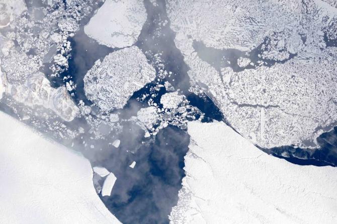 Terminus of the Zachariæ Isstrøm glacier in northeast Greenland, as seen from 28,000 feet during an Operation IceBridge flight on Aug. 29, 2017 Credits: NASA/LVIS TEAM