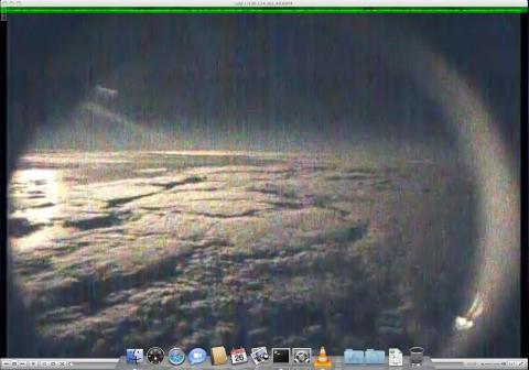 AV-6 nose camera view of moon over TS Nadine from 63,000 ft (9.27.12)